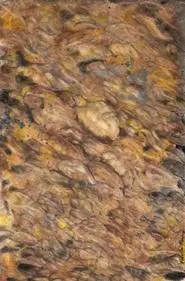 A blurry image of rocks and water.