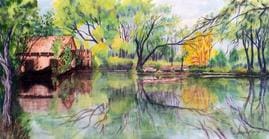 A painting of trees and water in the background