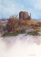 A painting of a desert landscape with trees and mountains.