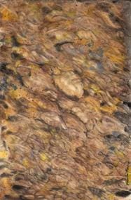 A blurry image of rocks and leaves in the water.
