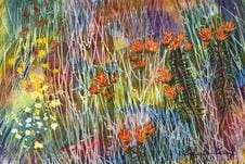 A painting of flowers in the grass