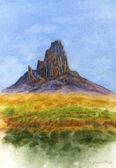 A painting of a mountain with grass in the foreground.